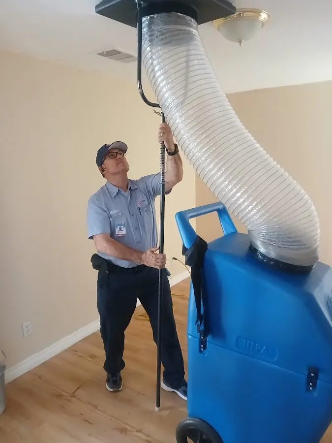Mini Split Installation technician using HEPA equipment in Neptune Beach